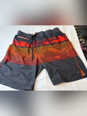 ZeroXposur Black Swim Board Shorts with Red, Orange, and Gray